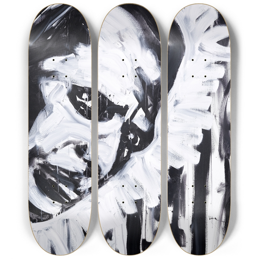 Untitled triptych skateboard series by Justin Chapman showing abstract black and white face across three decks
